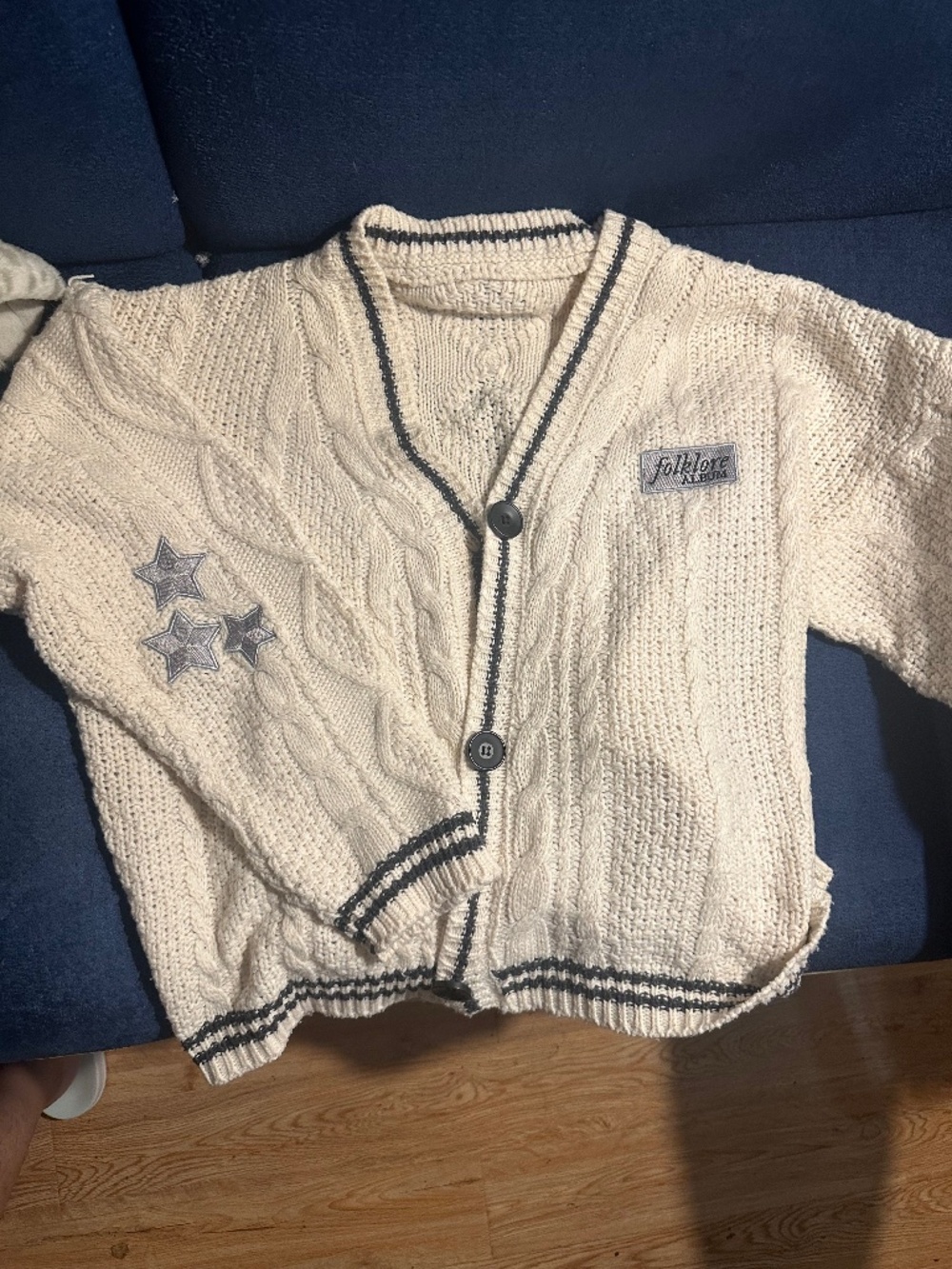 Taylor Swift Original Folklore Cardigan with the “Folklore” patch